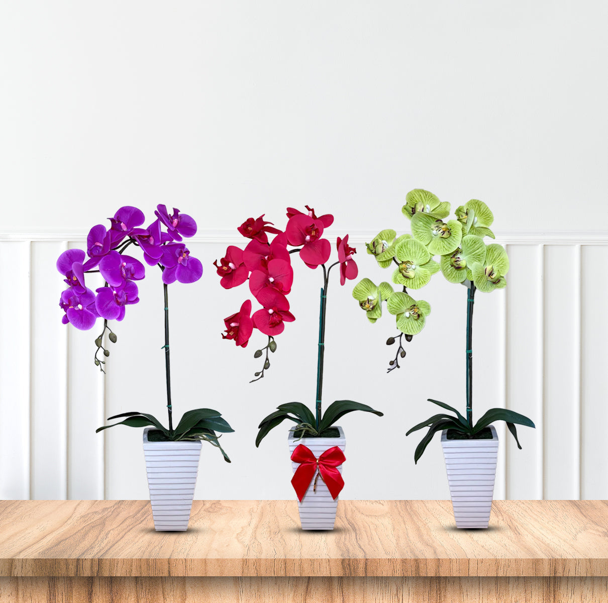 Artificial orchid in white triangular pot