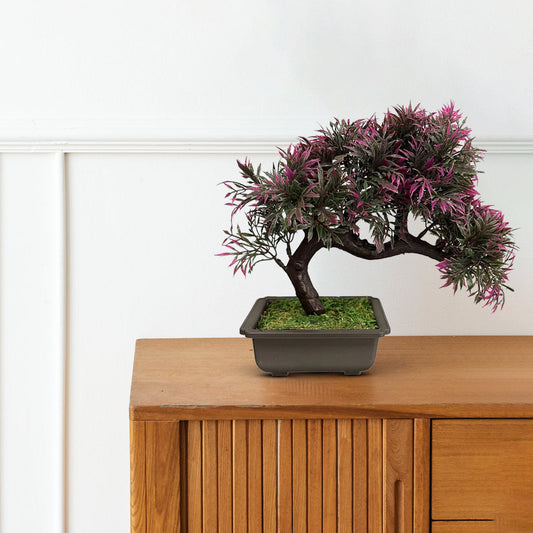 Artificial bonsai tree arrangement with realistic green leaves and curved design