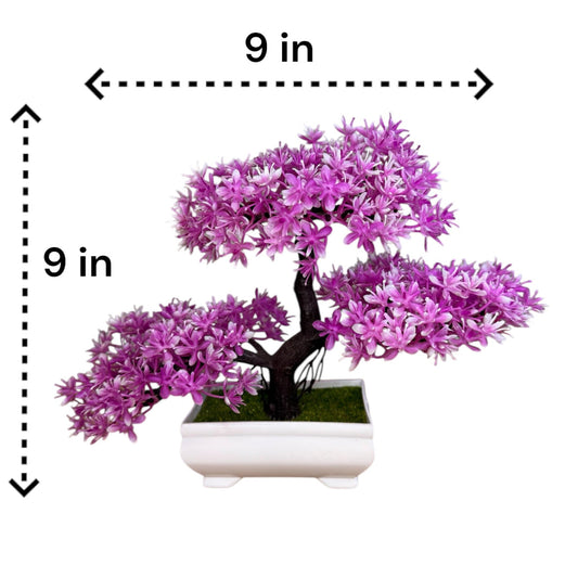 Artificial small bonsai tree in decorative white Pot