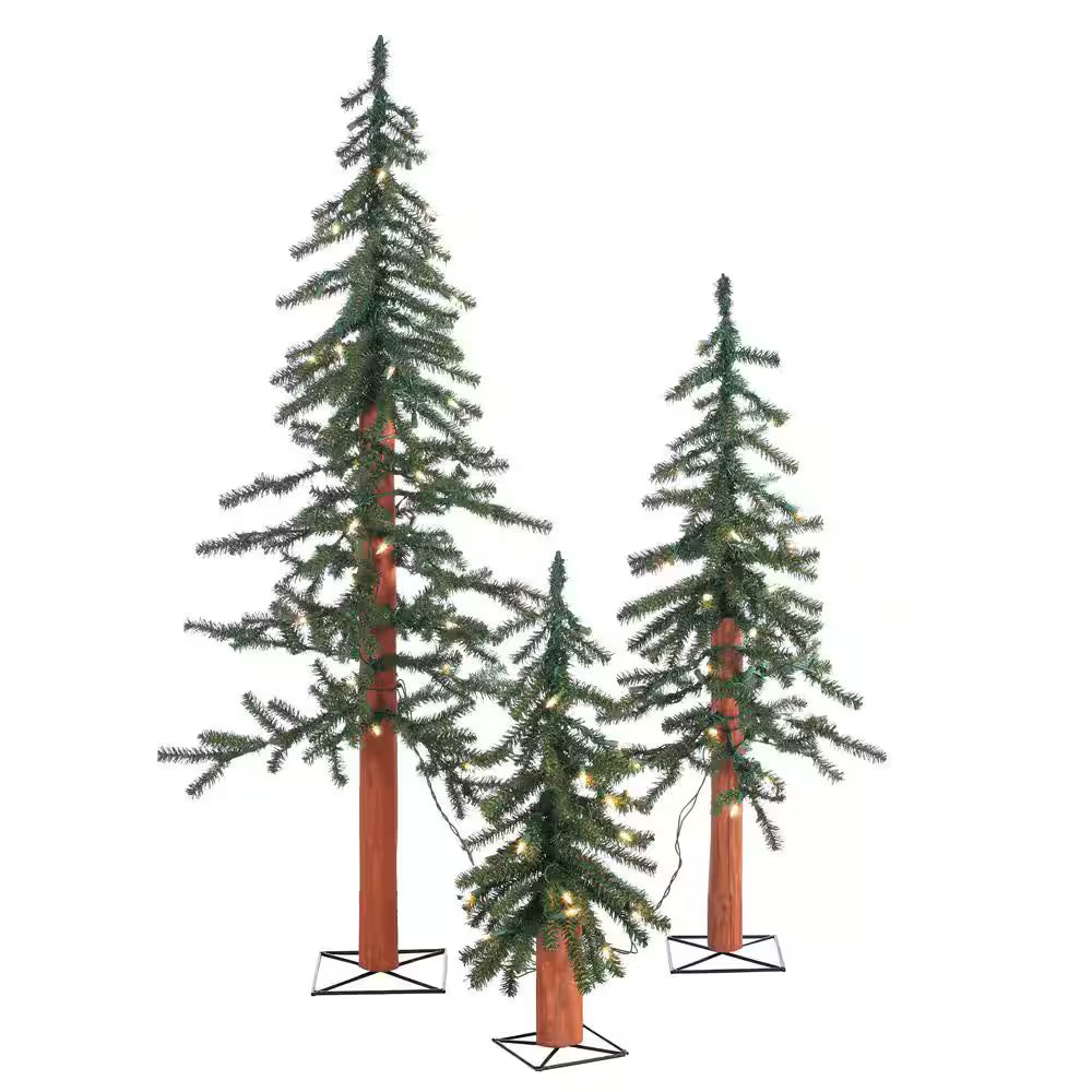 Pre-lit artificial Alpine Christmas tree with glowing lights and natural-looking branches